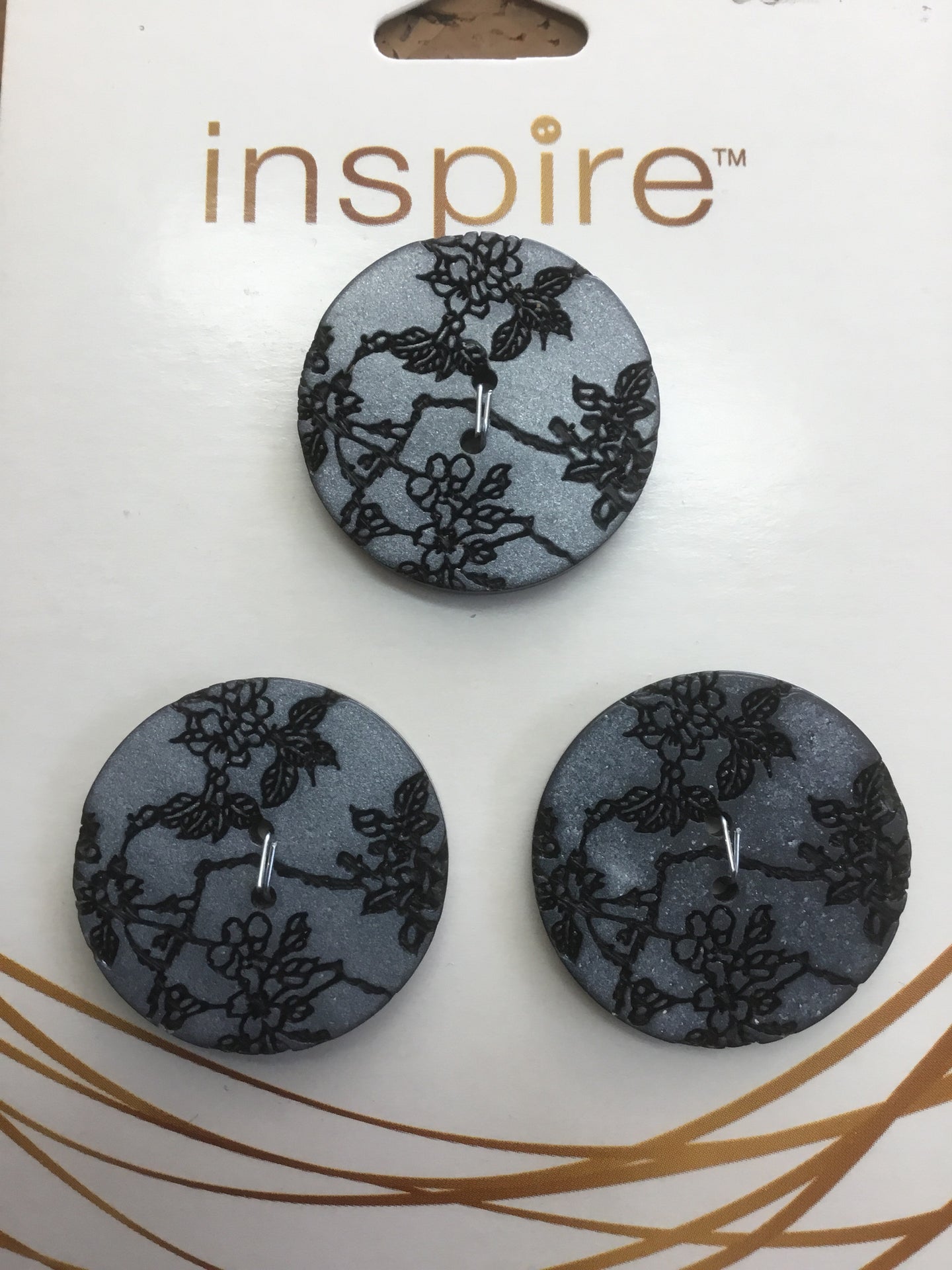 Laser etched buttons